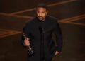 Michael B. Jordan accepts the award for best actor in a leading role for
