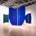 Art hangs in a museum.