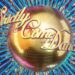 The logo for "Strictly Come Dancing" features a golden ball with sparkling effects, set against a vibrant blue background adorned with dynamic, radiating lines.
