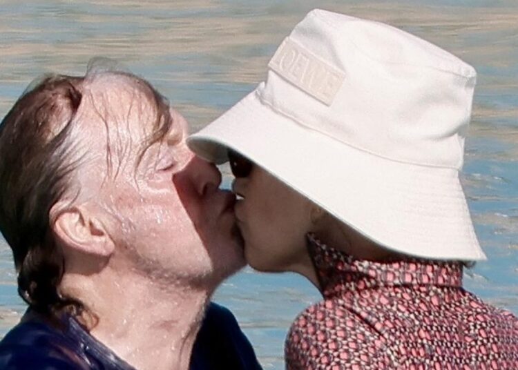 Beatles legend Sir Paul McCartney spotted in sweet embrace with wife on Caribbean holiday
