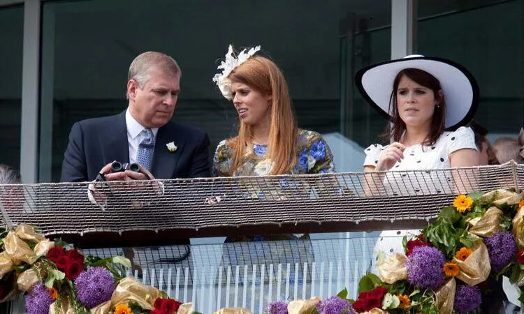 Andrew Mountbatten-Windsor, Princess Beatrice and Princess Eugenie attend the Derby Stakes at Epsom Racecourse in 2011. By: MEGA