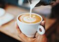 person making latte art