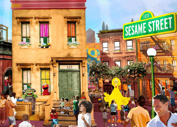 Colorful scene on Sesame Street with characters and families.