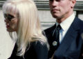 Actress Daryl Hannah, a friend of John F. Kennedy Jr., and actor Arnold Schwarzenegger, husband of Maria Shriver, arrive at St. Ignatius Catholic Church to attend funeral services for Jacqueline Kennedy Onassis.