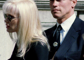 Actress Daryl Hannah, a friend of John F. Kennedy Jr., and actor Arnold Schwarzenegger, husband of Maria Shriver, arrive at St. Ignatius Catholic Church to attend funeral services for Jacqueline Kennedy Onassis.