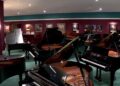 The showroom inside of Daynes Music where dozens of pianos are displayed.