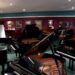 The showroom inside of Daynes Music where dozens of pianos are displayed.