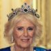 Queen Camilla wearing a blue dress and a tiara