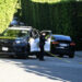 A police officer is seen outside Rihanna's Beverly Hills home after a report of gunshots on March 8, 2026Credit: DUTCH/Bauer-Griffin/GC