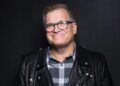 Drew Carey poses for The Artists Project at Rock To Recovery 5th Anniversary Holiday PartyCredit: Michael Bezjian/WireImage