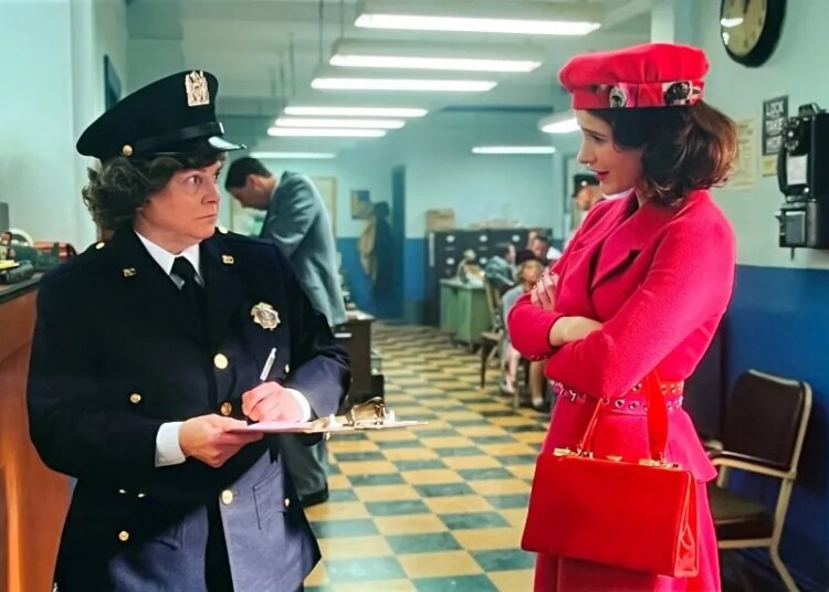 Wendy Davis as a cop talking to another woman in a scene from "The Marvelous Mrs. Maisel."