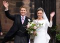 Hugh Grosvenor, Duke of Westminster and Olivia Grosvenor, Duchess of Westminster wave and smile to well-wishers after their wedding ceremony