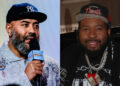 Ebro Darden with a beard, wearing a Yankees cap, holding a microphone, and Akademiks with a beard, wearing a Devils cap and chain.
