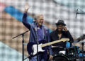 Eric Clapton waves to the fans during the Crossroads Guitar Festival at Crypto.com Arena on Sept. 24, 2023, in Los Angeles.