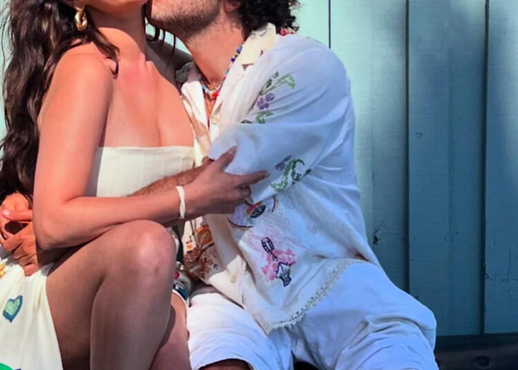 Benny Blanco kissing Selena Gomez