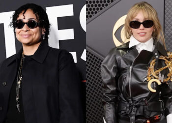 (L-R) Raven-Symoné and Miley Cyrus.