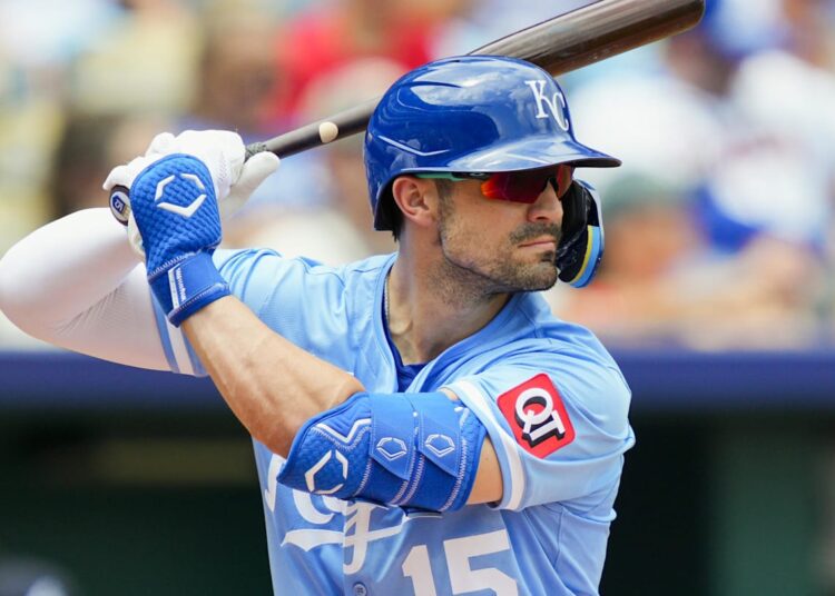 Jul 30, 2025; Kansas City, Missouri, USA; Kansas City Royals right fielder Randal Grichuk (15) bats during the second inning against the Atlanta Braves at Kauffman Stadium. Mandatory Credit: Jay Biggerstaff-Imagn Images