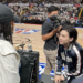 Tennis player Naomi Osaka, left, speaks with BTS member Suga at an NBA game in 2022. Captured from Instagram