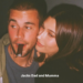 Two individuals embraced, with key details blurred for privacy.