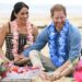 The Duke and Duchess of Sussex are returning to Australia next month - they are pictured here during a previous visit to the country, on Bondi Beach in Sydney in October 2018