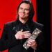 Jim Carrey accepts the Honorary César Award during the 51st César Film Awards