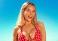 Helen Flanagan on beach in a red bikini