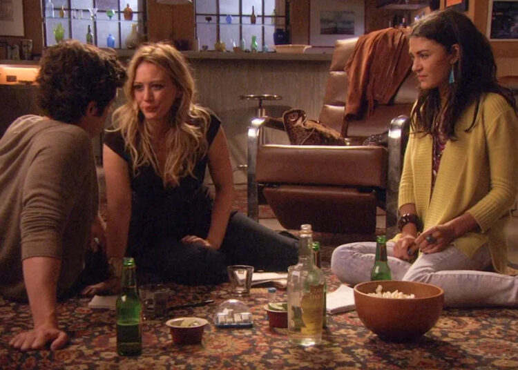 Dan Humphrey (Penn Badgley), Olivia Burke (Hilary Duff), and Vanessa Abrams (Jessica Szohr).Credit: The CW