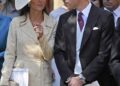 Andrew Mountbatten-Windsor went into 'basking shark mode 'and 'glowered' at the Princess of Wales while she was the 'centre of a royal fan frenzy' at Zara and Mike Tindall's wedding (pictured), a body language expert has claimed