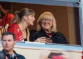 Oct 12, 2023; Kansas City, Missouri, USA; Grammy award winning artist Taylor Swift watches Kansas City Chiefs take the field along with Kansas City Chiefs tight end Travis Kelce (87) mom Donna Kelce prior to the game against the Denver Broncos at GEHA Field at Arrowhead Stadium. Mandatory Credit: William Purnell-Imagn Images