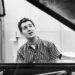 (Original Caption) 12/17/60: Singer Neil Sedaka seated at a piano.