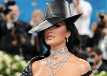 Kim Kardashian Is in Her Showgirl Era in Bold Bodysuit for Movie Shoot