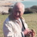 King Charles smiles as he looks at the Seven Sistiers