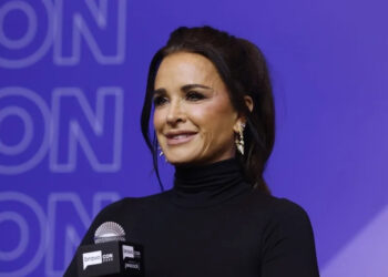 Kyle Richards smiles during a panel at BravoCon 2025.