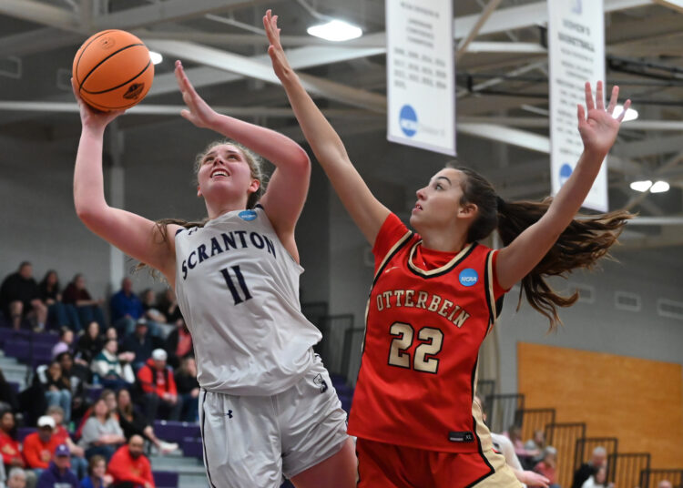 Otterbein’s Kate Mosher defends University of Scranton’s Kaci Kranson during...