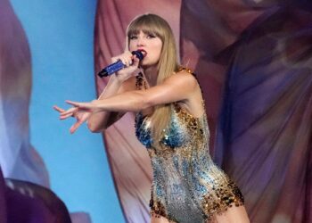 Lawsuit says Taylor Swift's 'Showgirl' pose comes too close to the work of a real one