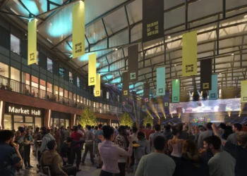 Hundreds of people dancing in the main square of the new venue