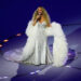 Singer Mariah Carey performs during the Olympic opening ceremony at the 2026 Winter Olympics, in Milan, Italy, Feb. 6, 2026. (AP Photo/Petr David Josek)
