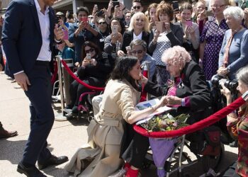 The Duke and Duchess of Sussex meet 98-year-old Daphne Dunne during a walkabout outside the Sydney Opera House on the first day of the Royal couple's visit to Australia in 2018
