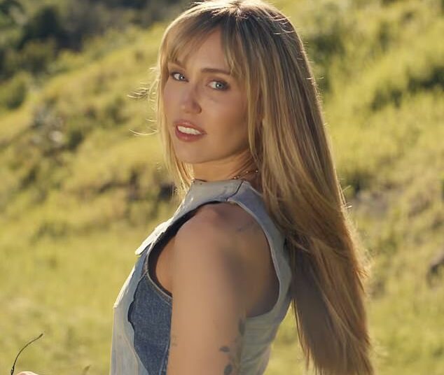 Miley Cyrus bid an emotional farewell to Hannah Montana in the music video for her new single Younger You