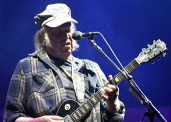 Neil Young performing at Glastonbury in 2025