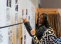 Guests explore the Detroit Symphony Orchestra's new exhibit, "50 Years of Classical Roots."