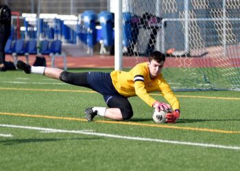 Matt Vasquez dives to make a save.