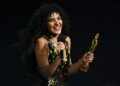 Olivia Dean receives the artist of the year award during the Brit Awards 2026