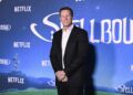 David Ellison stands in front of a Netflix background.