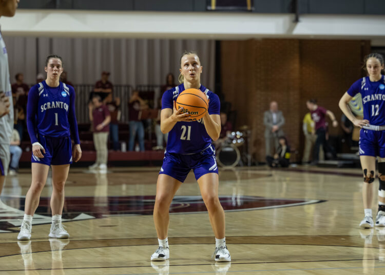 Meghan Lamanna of the University of Scranton eyes up a...