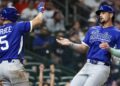 Mar 10, 2026; Houston, TX, United States;  Italy center fielder Jakob Marsee (5) celebrates right fielder Jac Caglianone (14) run against the United States in the sixth inning at Daikin Park. Mandatory Credit: Thomas Shea-Imagn Images