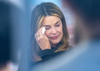Savannah Guthrie wipes away tears as she visits the "Today" show set at New York's Rockefeller Plaza earlier this month.