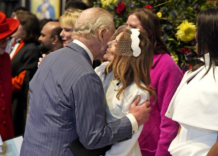 Spice Girl Geri Halliwell kisses King Charles at royal event