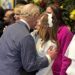 Spice Girl Geri Halliwell kisses King Charles at royal event