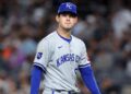 Oct 7, 2024; Bronx, New York, USA; Kansas City Royals pitcher Cole Ragans (55) reacts against the New York Yankees in the second inning during game two of the ALDS for the 2024 MLB Playoffs at Yankee Stadium. Mandatory Credit: Brad Penner-Imagn Images